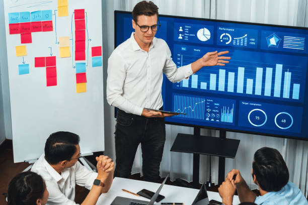 istock Presentation in office or meeting room with analyst team. Prudent 2085330299