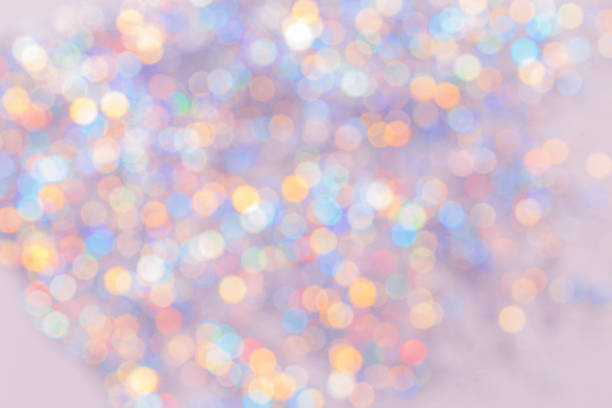 istock Defocused abstract bokeh background pastel colored, flare from lights, color gradient, blurred circle bokeh as holiday texture. Glittering aesthetic textured lighting pattern 2085332449