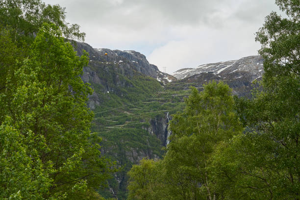 istock winding mountain road with many switchbacks and hairpins. 2085434487
