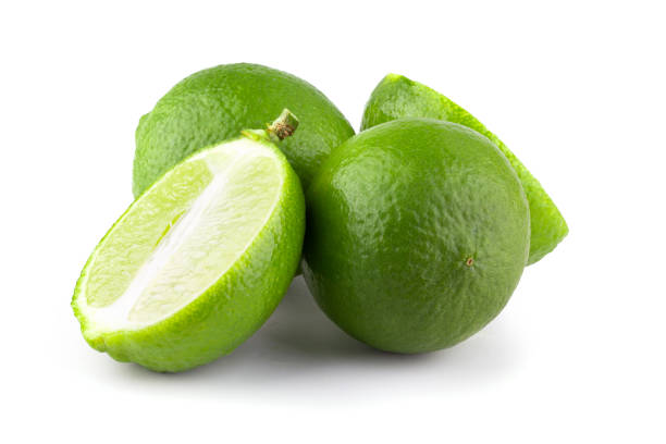 istock Whole and sliced limes, Sour green fruit isolated on a white background. 2085482157