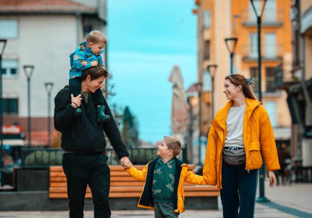 Family taking a walk down the street