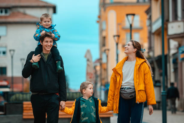 istock Family taking a walk down the street 2085483777