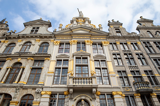 Grand Place, Brussels: City square encircled by elegant historic buildings dating back to the 14th century.