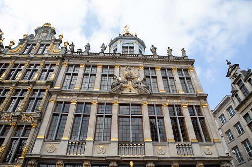 Grand Place, Brussels: City square encircled by elegant historic buildings dating back to the 14th century.