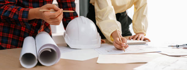 istock Professional engineer draws a blueprint on meeting table. Closeup. Delineation. 2085591197
