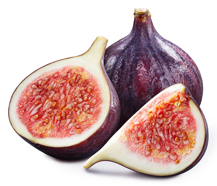 Fig and slice. Fig isolated on white background. Fig macro. Fresh fruits isolated on white background