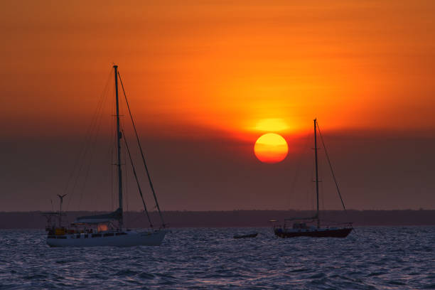 istock Sailing boats on the sea at sunset 2085605521