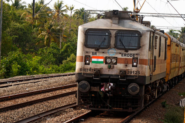 Kochi, Kerala, India -March 26, 2023 electric train moving through the indian railway track