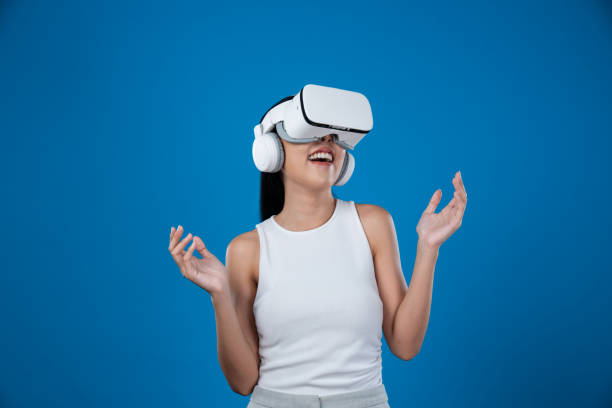 istock Elegant female stand excited seeing virtual scenery in metaverse. Hallucination. 2085622358