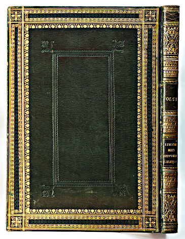 Turin, Piedmont, Italy - July 10, 2012: Old leather-bound book (with cover and spine gilded).