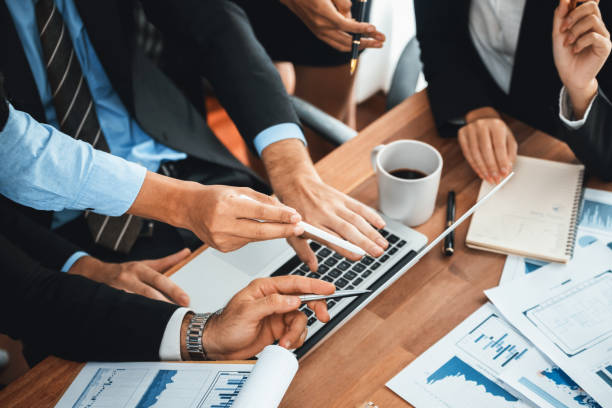 istock Group of business analyst team analyzing financial data report. Habiliment 2085643107