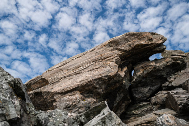 Woman hiking outdoors. Adventures in summer Norway, in the Bergen area.