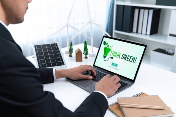 istock Businessman working in office developing plan on alternative energy. Gyre 2085664141