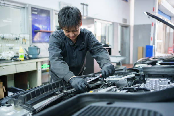 istock Mechanic repairing car 2085666944
