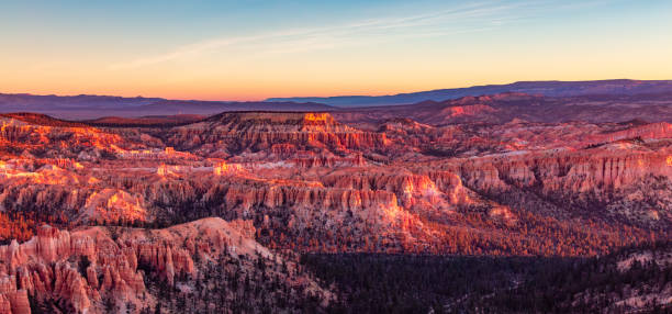 istock Desert Landscape with Red Rock, trees, and mountains. Sunny Sky. 2085680911