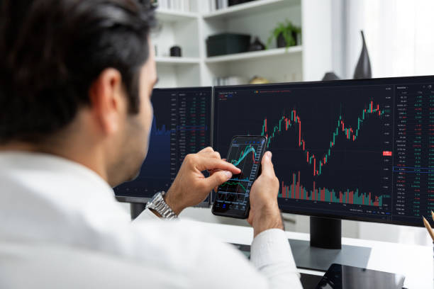 istock Trader businessman searching on smartphone, analyzing in dynamic stock. Surmise. 2085729919