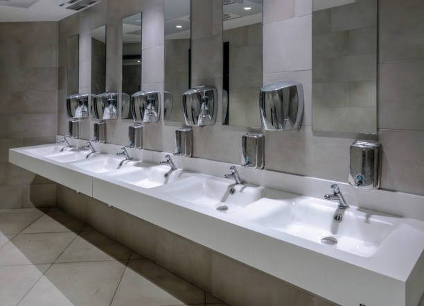 istock Washbasins with mirrors and soap dispensers 2085744205