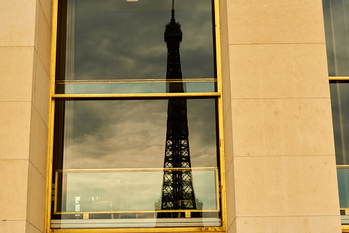 Eiffel Tower reflected in a window, golden frame