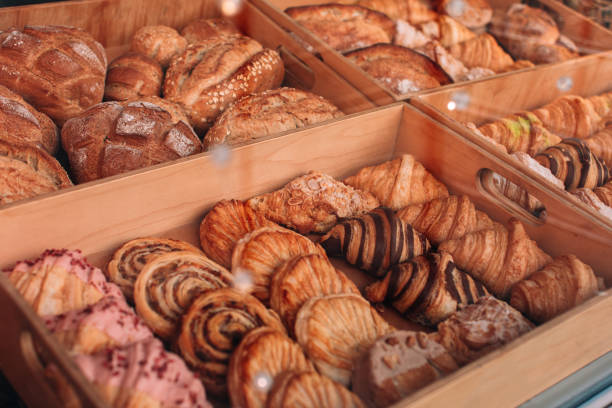 istock Freshly baked croissants with raspberries and sweet bread rolls with chocolate. 2085809714
