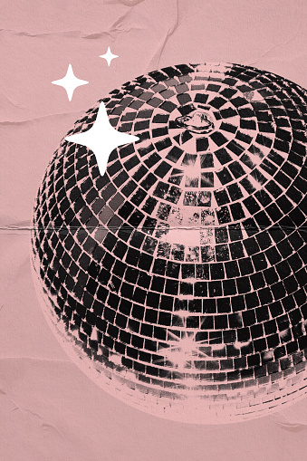 Close-up of disco ball on monotone pink background. Party atmosphere, nightclub. Disco dancing, entertainment and enjoyment. Concept of music, festival, creativity, retro and vintage. Creative design
