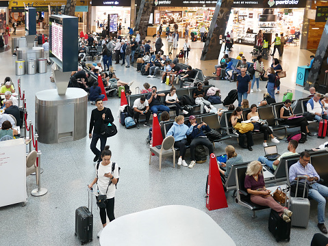 Lisbon, Portugal - Sept 2022: Airport waiting room crowded