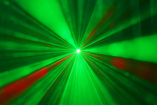 abstract background with green rays centered wallpaper