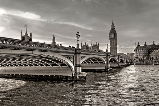 Big Ben and westminster bridge and thames river in London England UK black and white