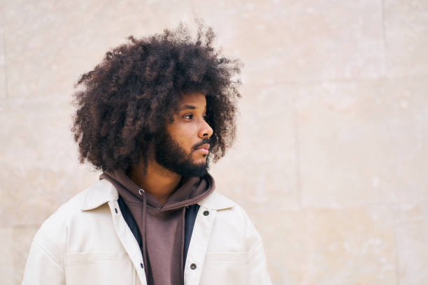 man with afro hair profile view