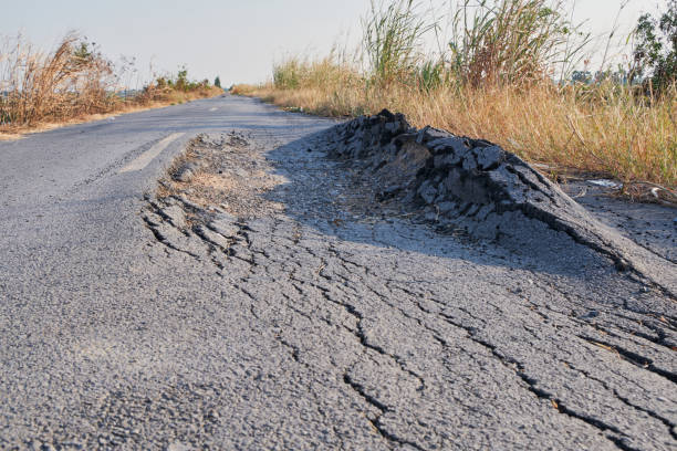 istock Asphalt surface on the street was demolished due to poor construction. 2085850140