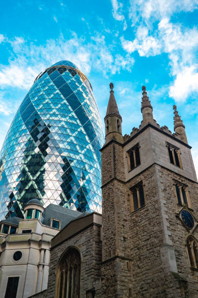 istock St Andrew Undershaft Church in front of modern skyscraper buildings background 2085853395