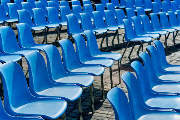 istock rows of seats in stadium vacant 2085904200
