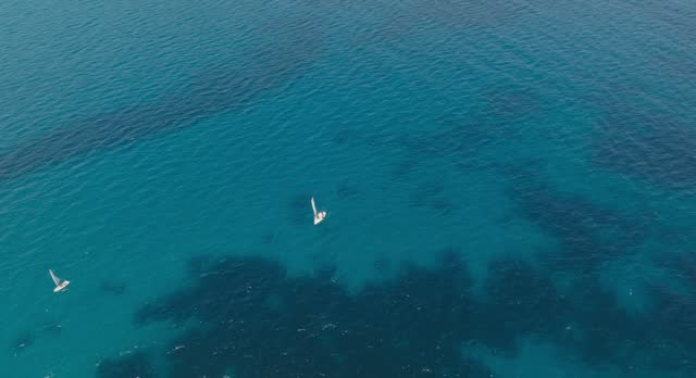 Aerial view of a boat sailing, Sicily.