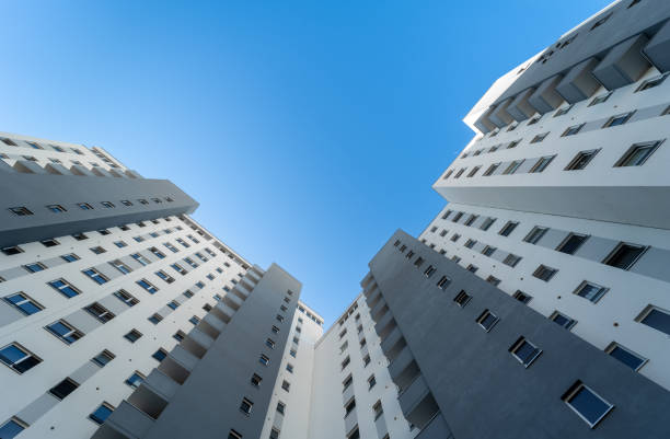 istock Low angle view of residential building against clear sky 2085933714