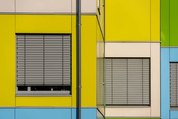 Germany, Berlin, March 05, 2024 - Colorful building with windows and closed blinds, Berlin Charlottenburg