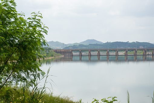 Close-up of a large dam on a river, water conservancy project facility
