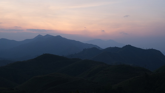 Sunset in the mountains of Thailand. View from the top of the mountain.