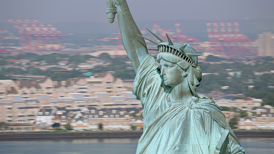 Aerial view of Statue of Liberty in sea, New York City, New York State, USA.