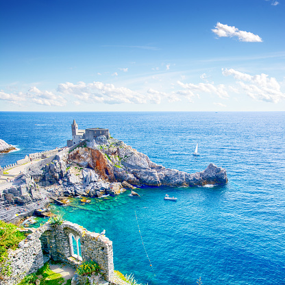 Church of St. Peter and ancient ruins in Portovenere, Italy. Composite photo