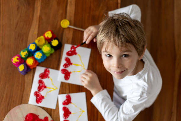 istock Child, making creative art picture with hearts for Valentine 2086033937