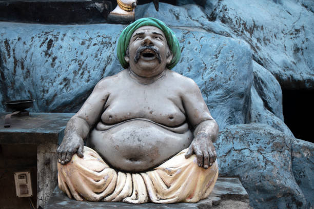 statue of a laughing fat man