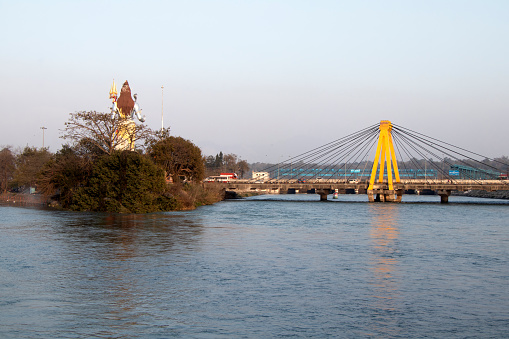 Image of a Hindu God Lord Shiva with his Trident at holy place haridwar.