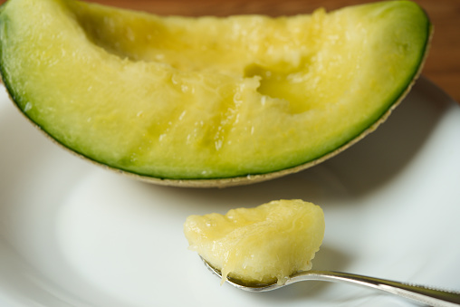 Melon and spoon.