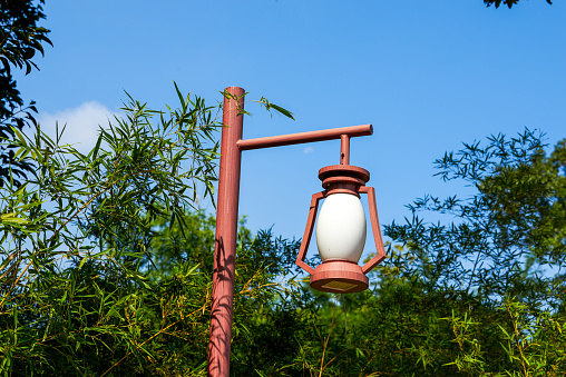 Close-up of street lamp chandelier in the park