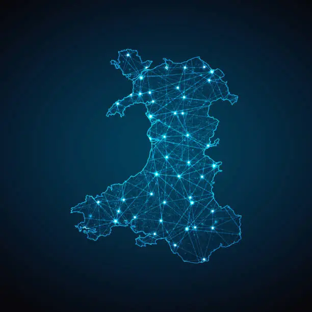 Vector illustration of Wales map geometric mesh polygonal light. Business wireframe mesh spheres from flying debris blue structure style