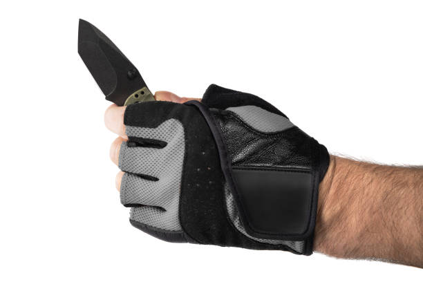 istock Hand in tactical glove, holding folding knife, on white background 2086241392