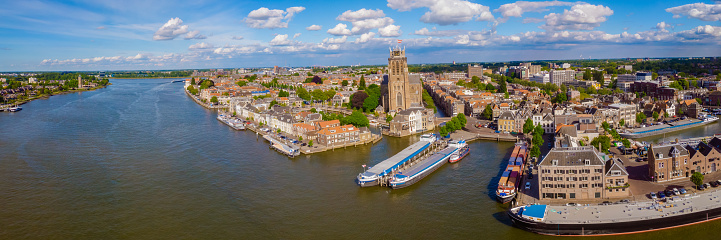 Dordrecht Netherlands, the skyline of the old city of Dordrecht with church and canal buildings in the Netherlands Oude Maas river