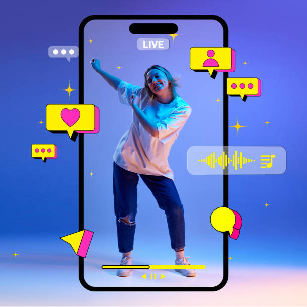 istock Social media live streaming. Happy young gird dancing inside giant mobile phone screen with different media icons of likes, followers and messages around. 2086250539