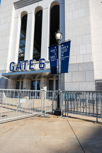 The Bronx, New York, USA – September 21th, 2023: Gate 6 of Yankee Stadium in The Bronx New York on a sunny morning. Crowd control fences remain unused