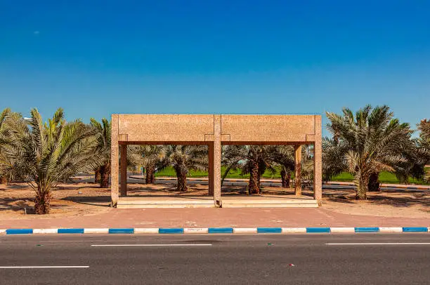 a brick roofing structure for pedestrians to shade from the sun in Kuwait City