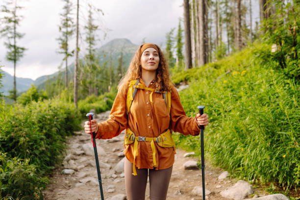 istock Backpacker in a hike in the summer mountains. 2086327156